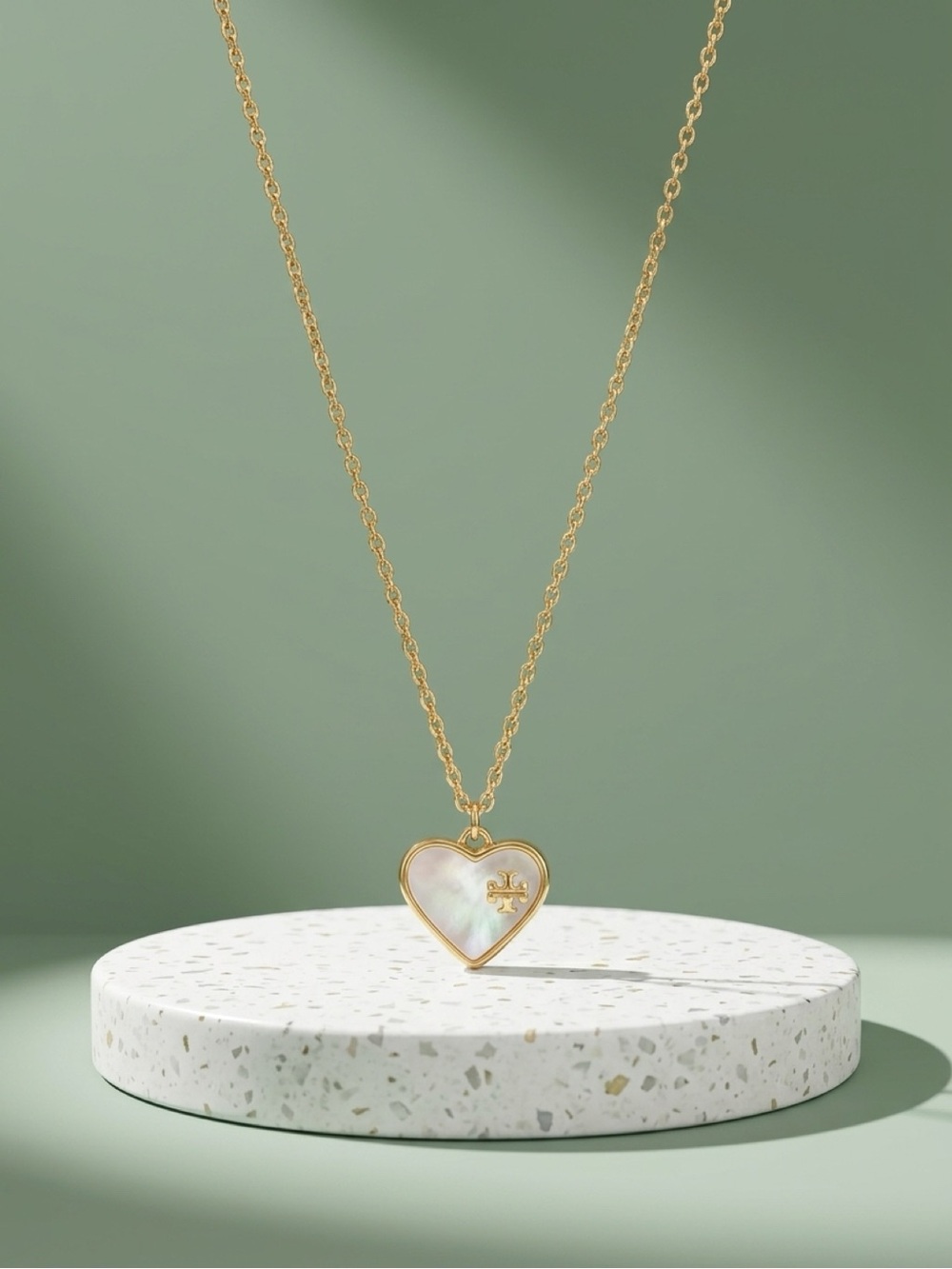 Tory Burch Gold Heart Necklace with Mother-of-Pearl Center